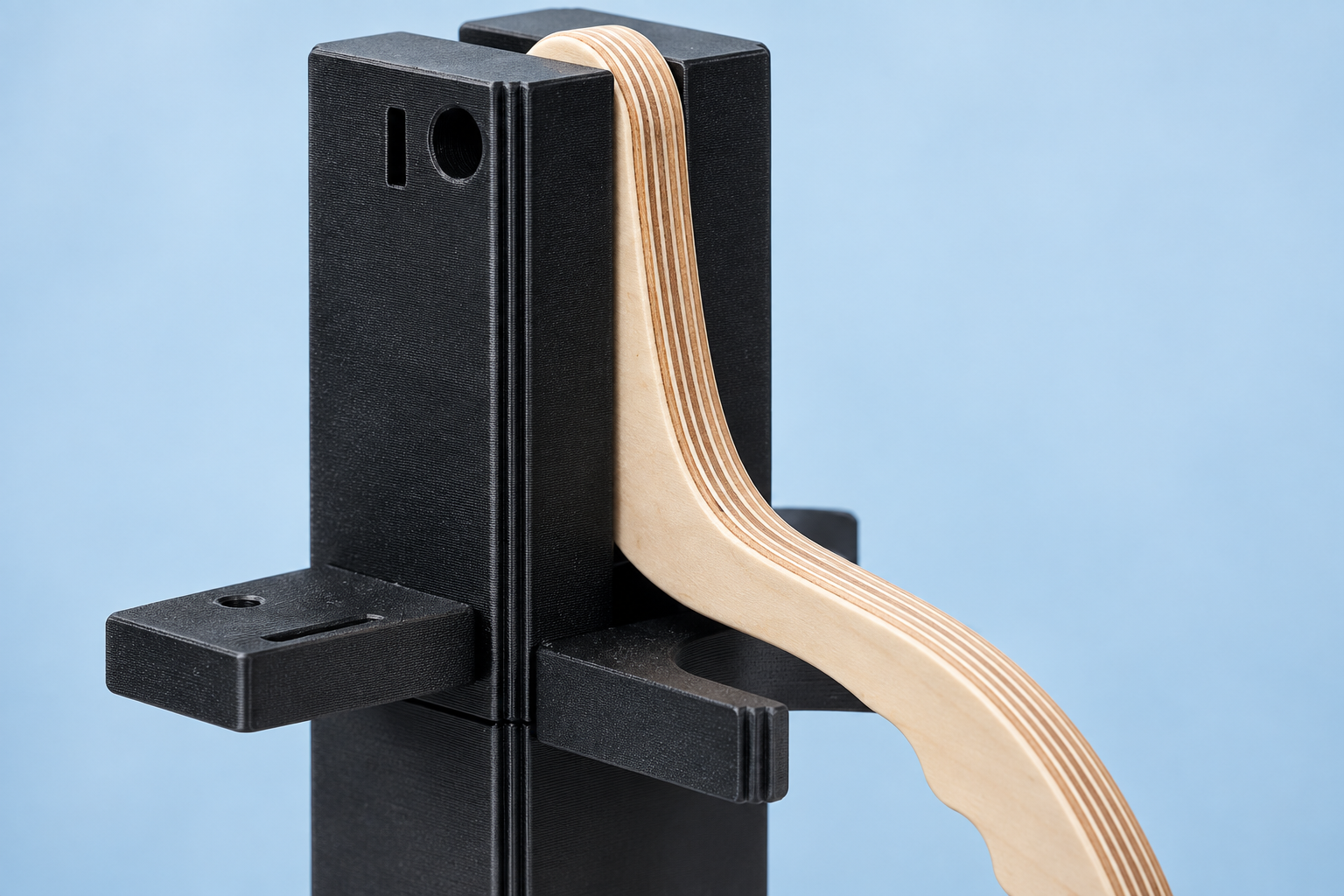 Close-up concept of the laminated birch lever and printed components